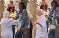 Watch: Eine Nonne wirft sich zwischen zwei küssende Girls
