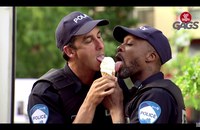 Watch: Two Cops Sharing An Ice Cream Cone